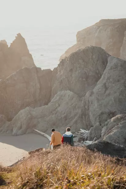 two men near the mountains