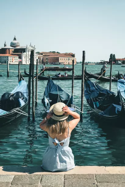 girl sitting by the water